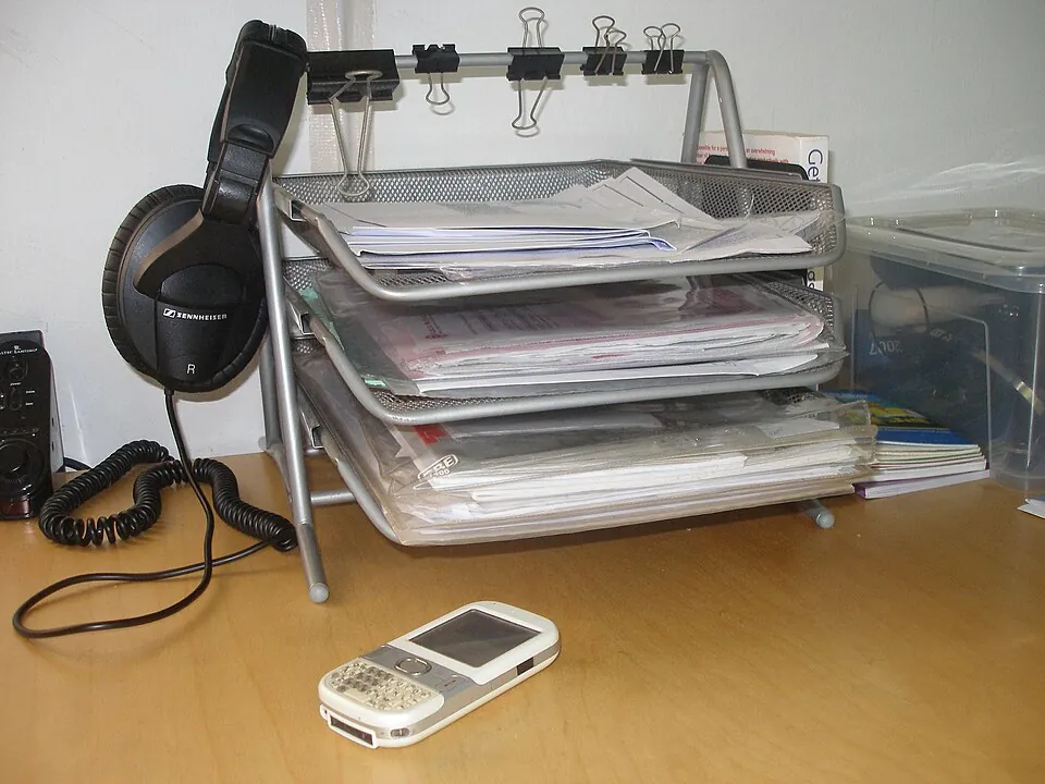 Three filled inbox trays