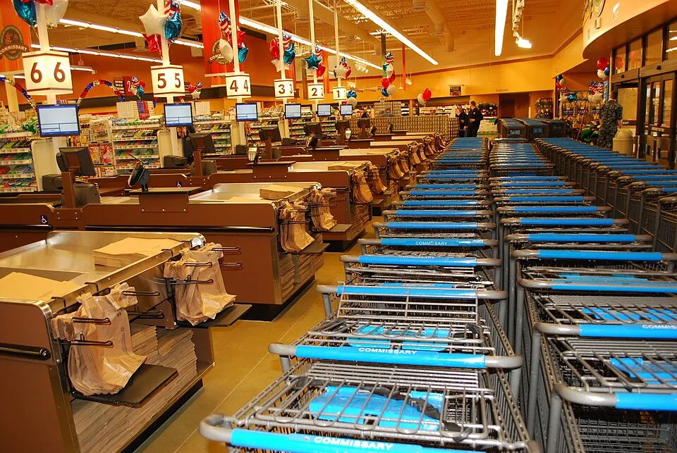 Empty shopping carts and checkout registers wait for commissary patrons hours before the grand opening of new store at Naval Submarine Base 